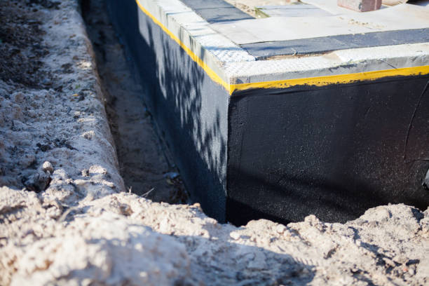 Professional Waterproofing technician working in Baxter, MN